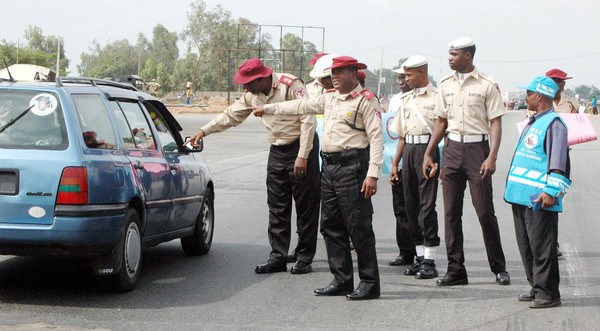   Operatives of Federal Road Safety Corps (FRSC) carrying out their duties on a highway in the country.